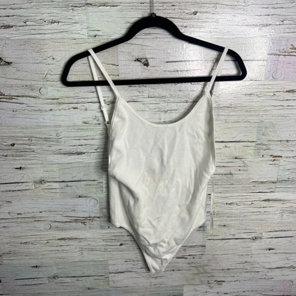 White by the way. Revolve bodysuit size small - Picture 1 of 7
